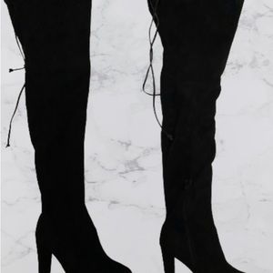 Black suede, thigh high, tie, 4 inch heel, zipper on the lower inside of boots